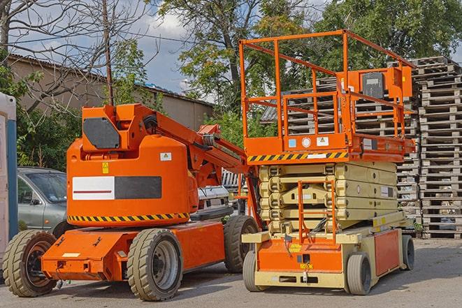 pallets being moved by forklift in a well-organized warehouse setting in Lasara